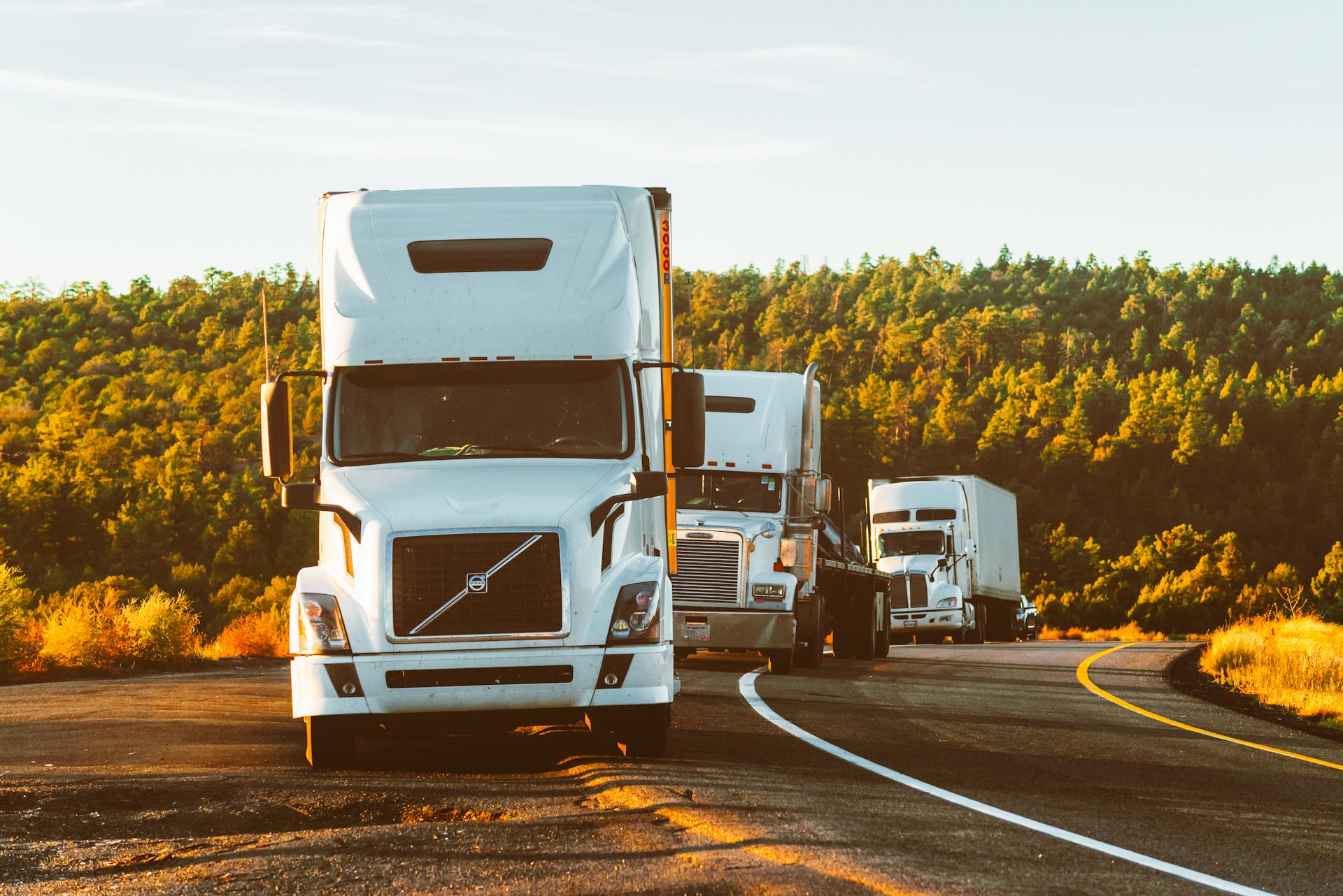 POWERLOAD EXPRESS INC tractor-trailer loaded and rolling